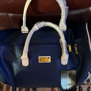 Nicole Miller Navy and white duffle travel bag
